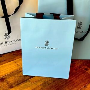Ritz-Carlton paper shopping bag with black ribbon handles